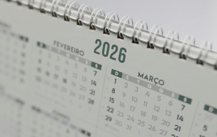 Close-up view of a 2026 spiral-bound desk calendar showing February and March.